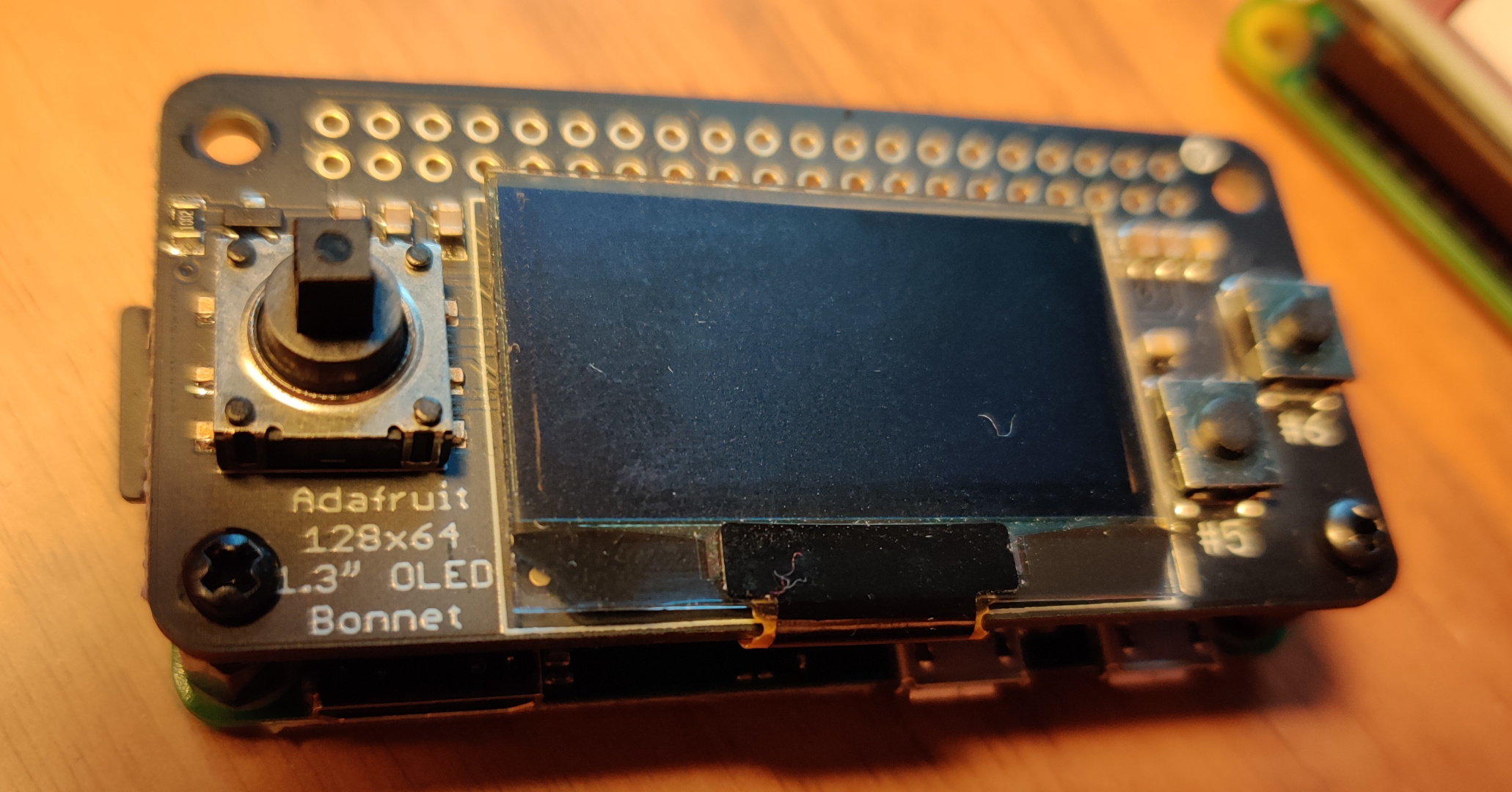 Unused Pi Zero with OLED Bonnet, looks like a small game console